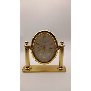 Linden Quartz Oval Desk Clock Gold Tone Swivel Pillar Mantle Timepiece